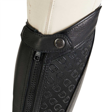 Mini-chaps en cuir unisex avec bande élastique et logos Vespucci Equestro Mini-chaps en cuir unisex avec bande élastique et logos Vespucci Equestro