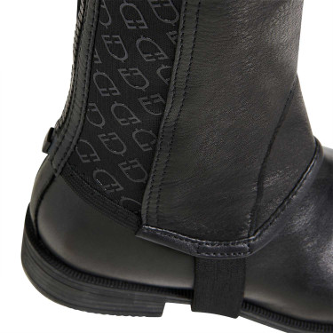 Mini-chaps en cuir unisex avec bande élastique et logos Vespucci Equestro Mini-chaps en cuir unisex avec bande élastique et logos Vespucci Equestro