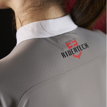 Polo de concours femme Equestro Ridertechnology à manches longues et zip Polo de concours femme Equestro Ridertechnology à manches longues et zip